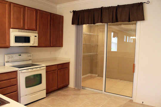 Kitchen & Sunroom Before